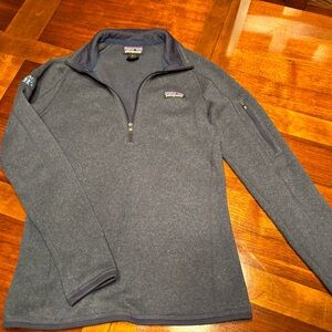 Patagonia Jackson Hole, Wyoming logo on sleeve bought from the town square.
